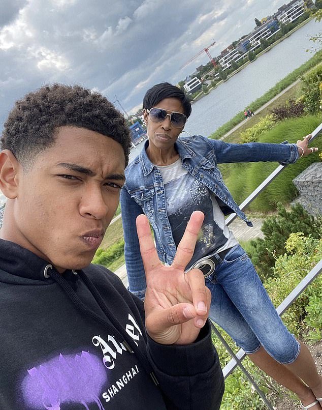 Denise has travelled with Jude as his career has taken him from Birmingham to Germany and on to Spain. Pictured: Jude taking a selfie with his mother, Denise