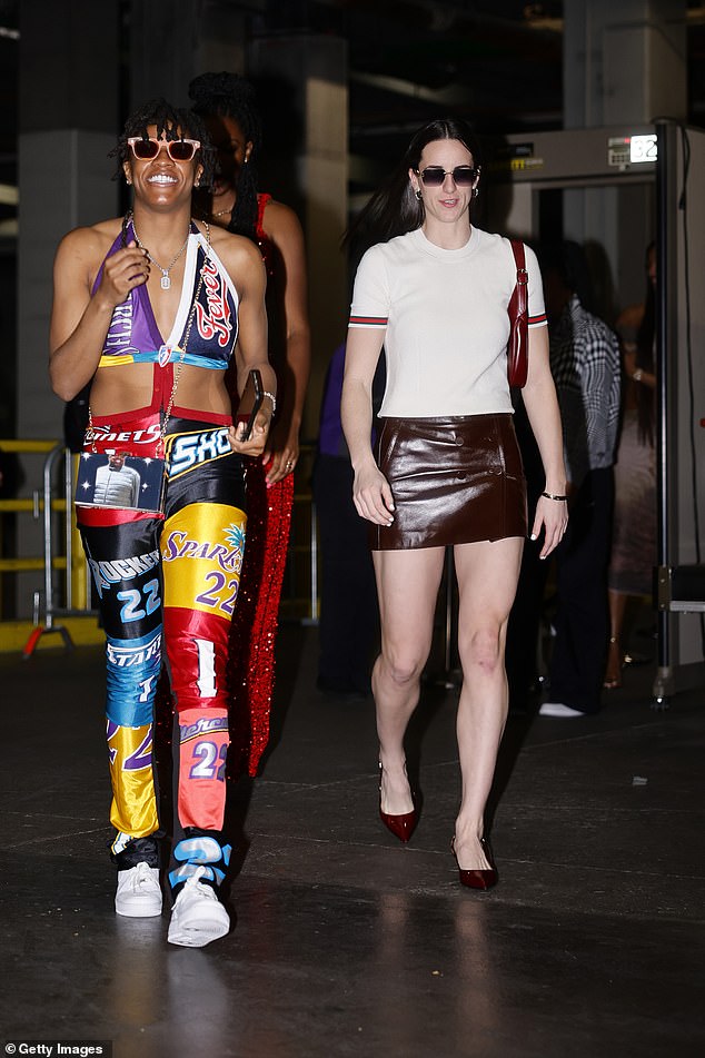 Clark was accompanied by two of her Indiana Fever teammates, including Kelsey Mitchell (left)