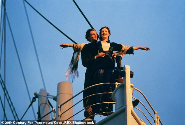 Leonardo DiCaprio and Kate Winslet on the bow of the ship in an iconic scene from the 1997 film Titanic