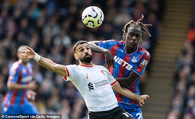 Trevoh Chalobah (right) pictured tussling for the ball with Liverpool forward Mohamed Salah