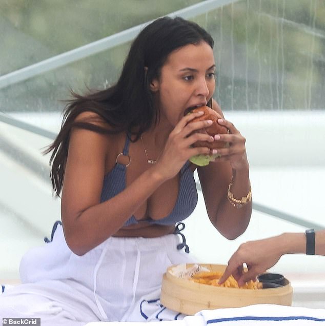 Certainly making the most of her downtime, Maya was seen chowing down on a hearty burger and chips, before washing it down with a large bottle of water