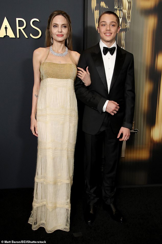 Angelina walked arm-in-arm with her young son, whom she shares with her ex, Brad Pitt