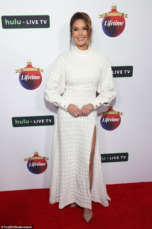 The actress wowed in a white long-sleeved gown adorned with a subtle checked detailing and buttoned sleeves