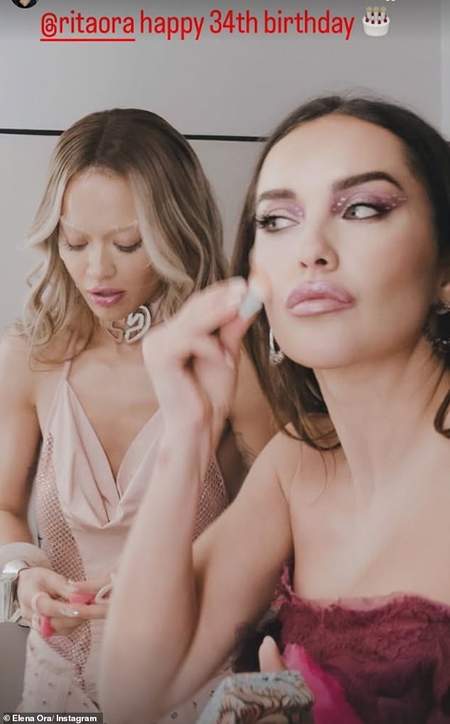 Elena, who manages her sister, also shared a candid snap of the pair getting ready for a night out as they applied their makeup in the mirror