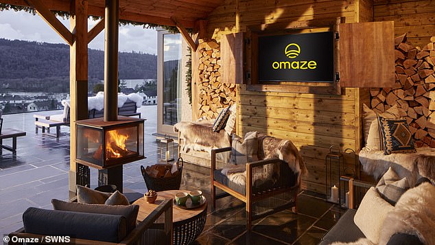 The house has outdoor log cabin-esque seating area equipped with a warming fire so the space can be enjoyed all year round