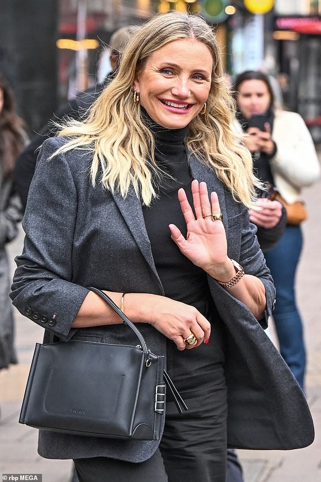 Cameron Diaz put on an effortlessly chic display in a stylish grey blazer as she left Global Studios following her appearance on the Heart Breakfast Show alongside Jamie Foxx on Friday