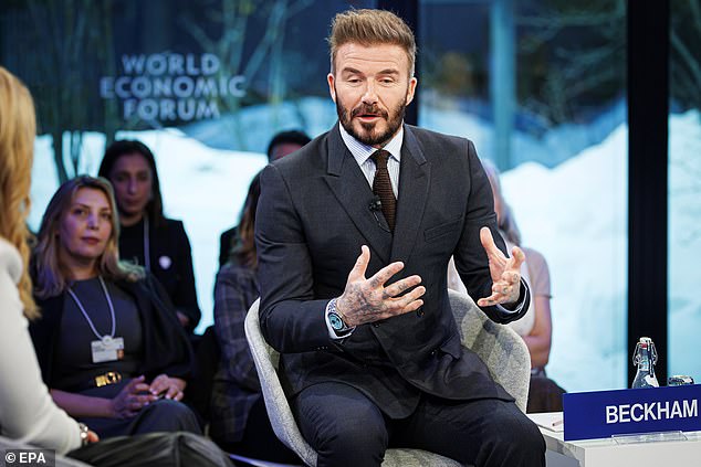 David looked typically dapper in a striped blue shirt and knitted tie, which he wore with a charcoal double breasted suit and smart dress shoes