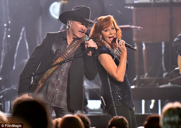 Country legends: Reba McEntire performed a medley of songs with Brooks And Dunn before the end of the show