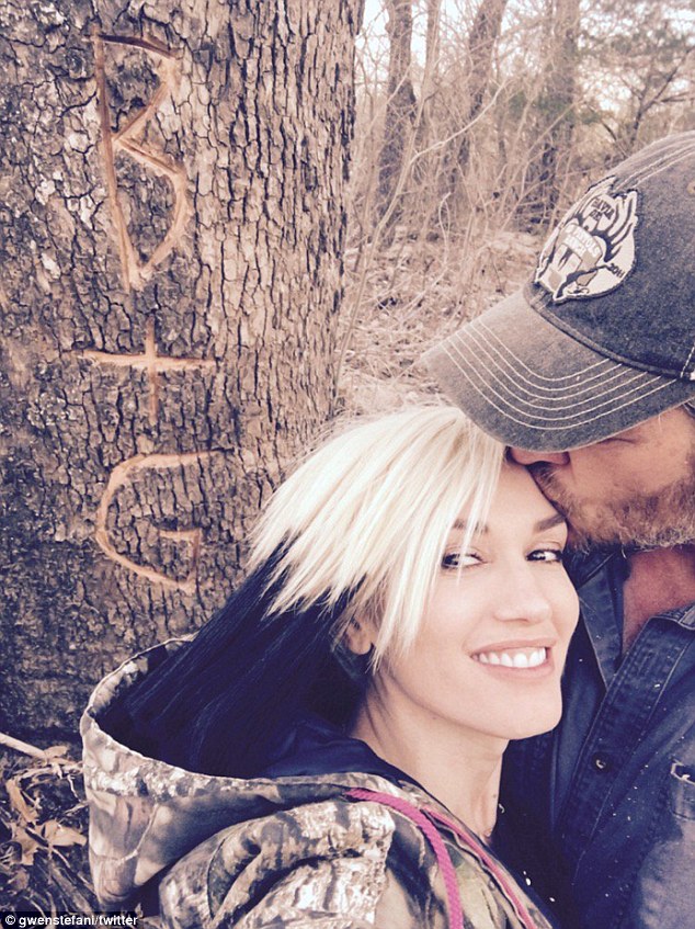 Aren't they sweethearts? Shelton was seen kissing Gwen Stefani in this photo shared by the siren on Monday