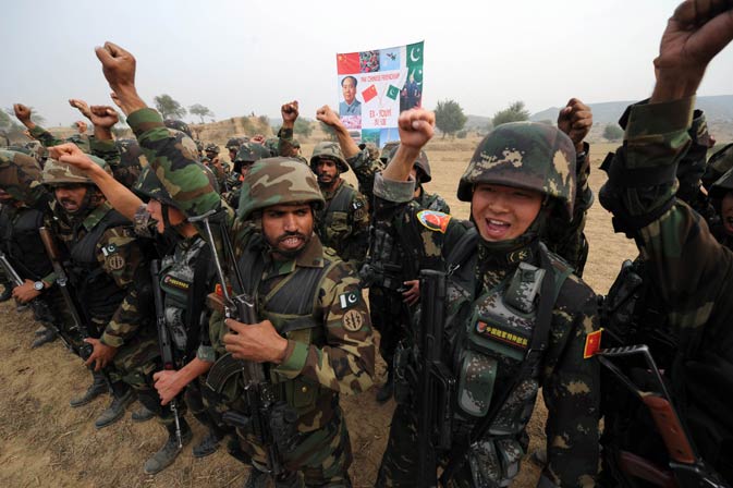 Chinese People's Liberation Army (PLA) soldiers and Pakistani commandos from the Special Service Group (SSG) shout ?Long live China, long live Pakistan? as they wrap up their two-week military exercise. ? AFP Photo.