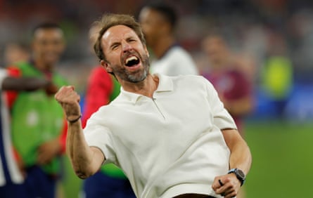 Gareth Southgate celebrates victory after the final whistle during the 2024 European Championship semi-final match against Netherlands.