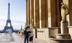 Couple at Palais Chaillot with Golden Figurines and Eiffel Tower