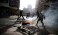 Protesters set a roadblock on fire during a rally against Venezuela's President Maduro's government in Caracas<br>Protesters set a roadblock on fire during a rally against Venezuela's President Nicolas Maduro's government in Caracas, Venezuela, June 26, 2017.  REUTERS/Ivan Alvarado