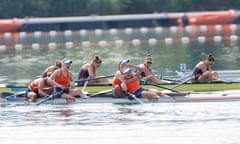 The Dutch crew celebrate while Helen Glover’s Team GB quartet look devastated after losing by 0.18 seconds.