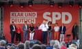 German Chancellor Olaf Scholz speaks on stage in Jena, eastern Germany on 27 August 2024, during an electoral campaign meeting of the Social Democratic Party (SPD), ahead of Thuringia's State elections.