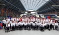 Members of the ParalympicsGB team pose as they arrive back in the UK via Eurostar at St Pancras.