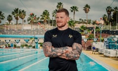 Adam Peaty by a pool in Tenerife