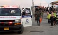 Soldiers, emergency services and civilians at the site where a playground in Majdal Shams