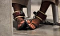 A Guantanamo detainee's feet are shackled to the floor as he attends a "Life Skills" class at Guantanamo Bay U.S. Naval Base.