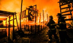 Fires Sweeps Through Shantytown On Outskirts Of Sao Paulo<br>(160914) -- SAO PAULO, Sept. 13, 2016 (Xinhua) -- Firefighters try to extinguish the fire at the community of Osasco on the outskirts of Sao Paulo, Brazil, on Sept. 13, 2016. According to Sao Paulo’s fire department, no casualties have been reported yet. It is estimated that at least 100 houses were affected. PHOTOGRAPH BY Xinhua / Barcroft Images London-T:+44 207 033 1031 E:hello@barcroftmedia.com - New York-T:+1 212 796 2458 E:hello@barcroftusa.com - New Delhi-T:+91 11 4053 2429 E:hello@barcroftindia.com www.barcroftimages.com