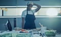 A young woman stare exasperatedly at a kitchen setup.