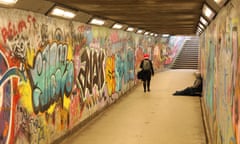 Homeless man in a subway tunnel