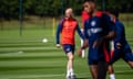 Erik ten Hag leads a training session at Carrington.