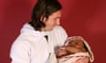 This photo taken in Sept. 2007 shows a 20-year-old Lionel Messi, who had embarked on his legendary Barcelona career just over four years prior, cradling Lamine Yamal, who was merely six months old at the time during a photo session in the dressing room of the Camp Nou stadium in Barcelona, Spain. Lamine Yamal is now a soccer sensation for both Spain and Barcelona and he is still only 16-years-old. (AP Photo/Joan Monfort)