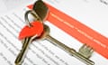 House keys on a bank letter informing customer of mortgage arrears