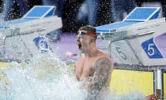 Adam Peaty celebrates wildly after winning 50m breaststroke gold in Birmingham.