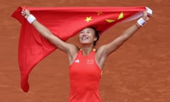 Zheng Qinwen celebrates after winning gold against Donna Vekic of Croatia.