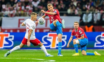 Tomas Soucek of Czech Republic sprays a ball past Poland’s Damian Szymanski during their Euro 2024 qualifier in November 2023.