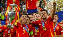 Álvaro Morata, left, and Rodri with the Euro 2024 trophy. 