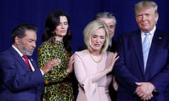 Donald Trump participates in a prayer before speaking at an Evangelicals for Trump event at the King Jesus International Ministry in Miami, in January.