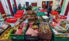 Volunteers and staff at prepare to open a food bank in East Sussex.