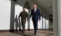 US President Joe Biden walks with Ukraine's President Volodymyr Zelensky through the colonnade of the White House, in Washington, DC