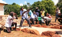 Tiwi Island men and Northern Territory MP Francis Kurrupuwu perform the "bombing of Darwin" dance on Tuesday.