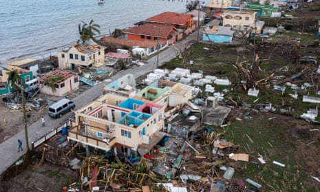 Damaged houses and buildings along the coast of the island of Carriacou, Grenada, in the wake of Hurricane Beryl. 