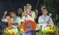 Narendra Modi participating in a roadshow during an election campaign ahead of India's election