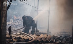 Ukrainian firefighters work following a Russian aerial attack in the city of Oleksievo-Druzhkivka, Donetsk oblast in eastern Ukraine, which killed seven people earlier this week.