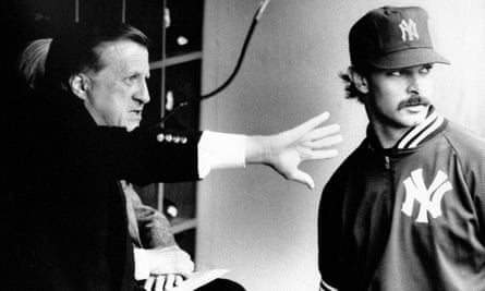 George Steinbrenner speaks to Don Mattingly before a game