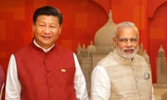 FILE- Indian Prime Minister Narendra Modi, center, Russian President Vladimir Putin, right, and Chinese President Xi Jinping stand for photographs prior to dinner hosted by Modi for leaders of BRICS nations in Goa, India, Oct.15, 2016. Putin and Xi will not be attending the weekend G20 summit in New Delhi, instead sending lower-level officials. While neither Russia nor China spelled out why their leaders were not attending, neither have traveled a lot recently and both seem to be putting a greater emphasis on the more like-minded BRICS group of nations. (AP Photo/Manish Swarup, File)