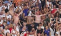 England fans celebrate victory in the last-16 match against Slovakia at Arena AufSchalke in Gelsenkirchen.