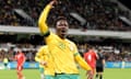 Nestory Irankunda celebrates after scoring his first international goal for the Socceroos