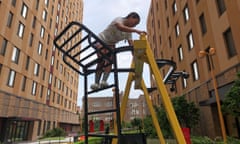 A child climbs on a play ladder