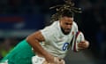 Chandler Cunningham-South runs with the ball against Ireland in the Six Nations