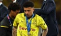 Jadon Sancho cuts a dejected figure as he collects his Champions League runners-up medal