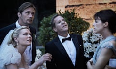 Lars Von Trier's Melancholia: characters at a wedding looking up into the sky