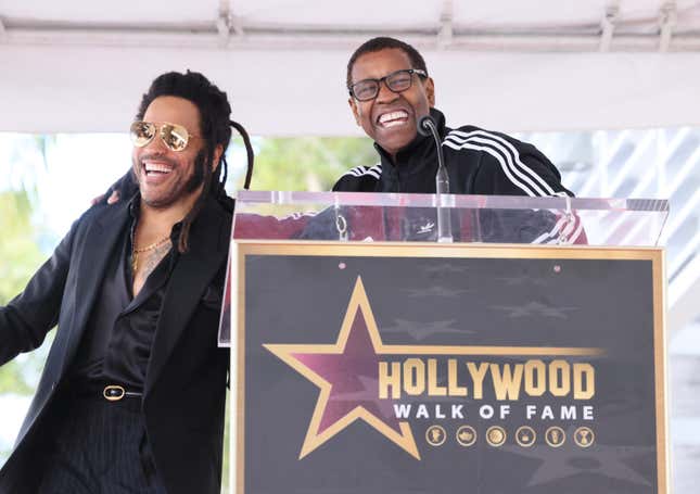 Image for article titled Wait, What? Lenny Kravitz Takes Phone Call From Denzel Washington While On Stage