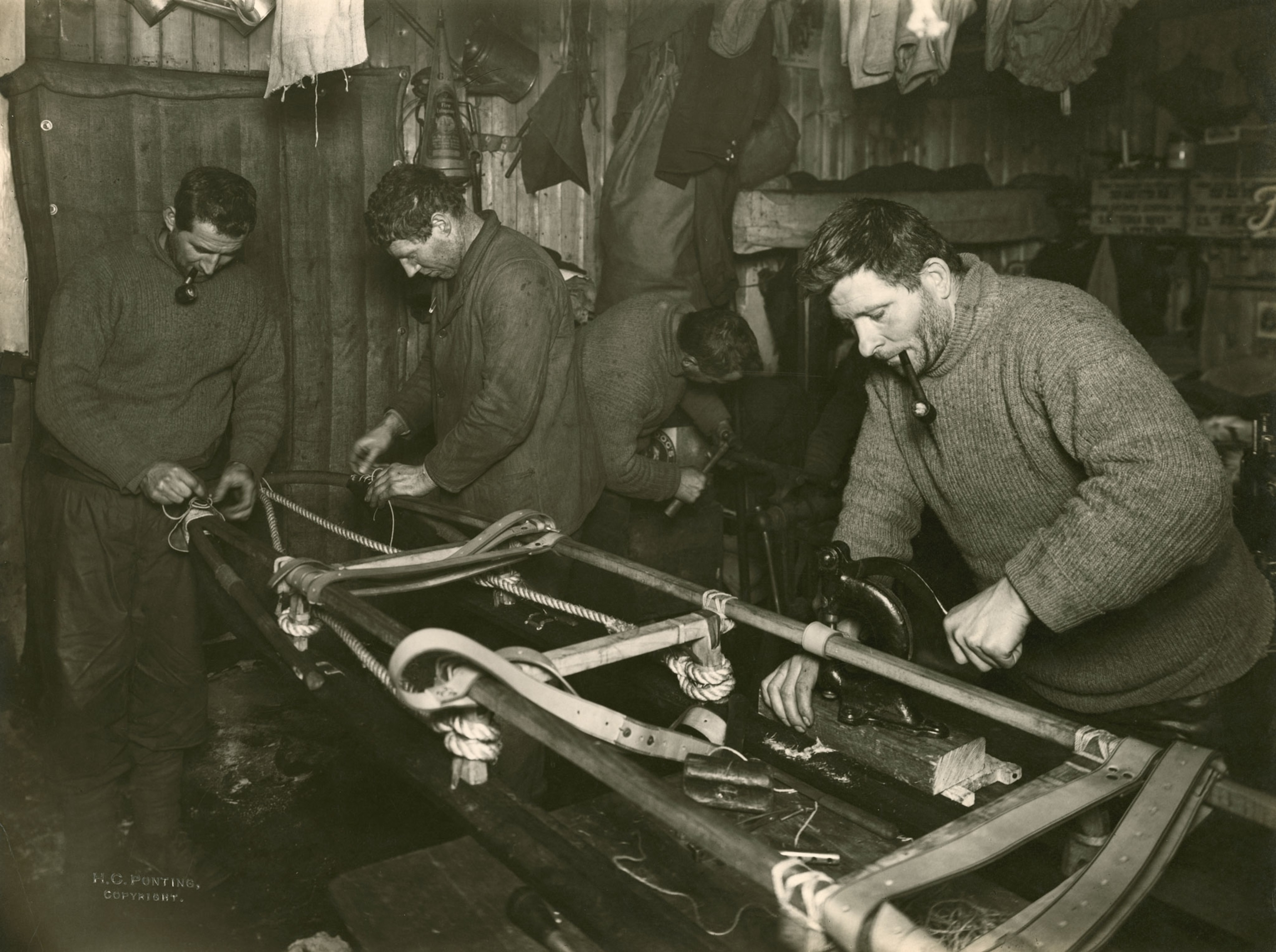 team members put together a sledge during Captain Scott's expedition